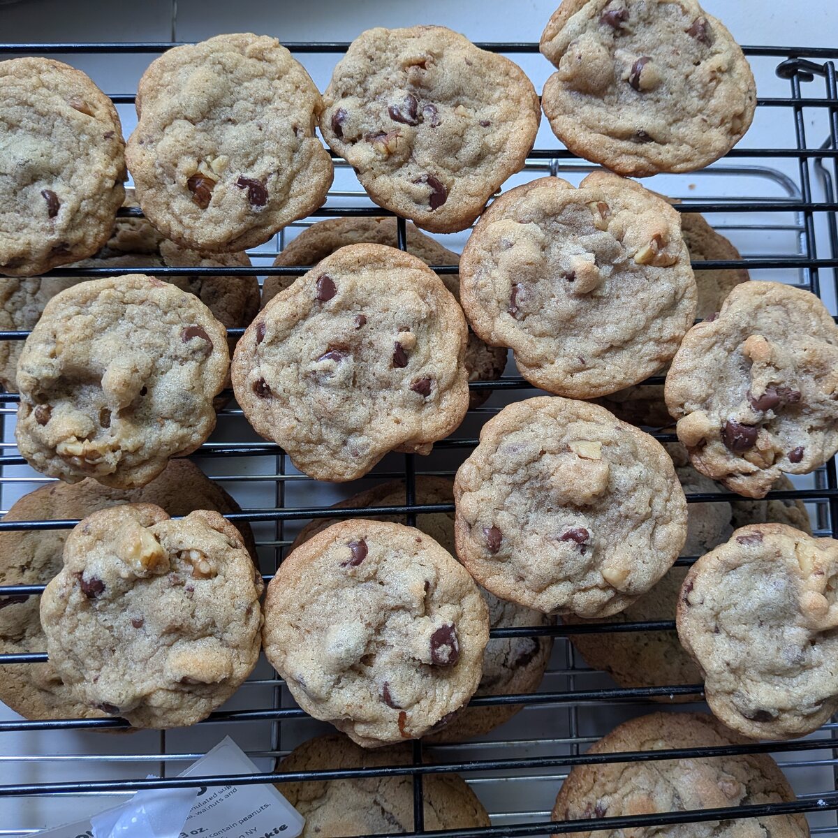 Golden Walnut cookies cooling on a baking rack.