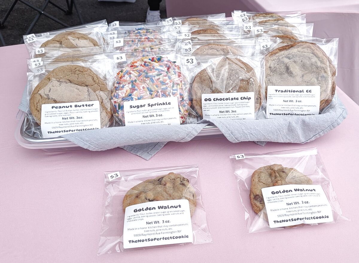 Assorted individually wrapped cookies displayed at the Victor Farmers' Market.