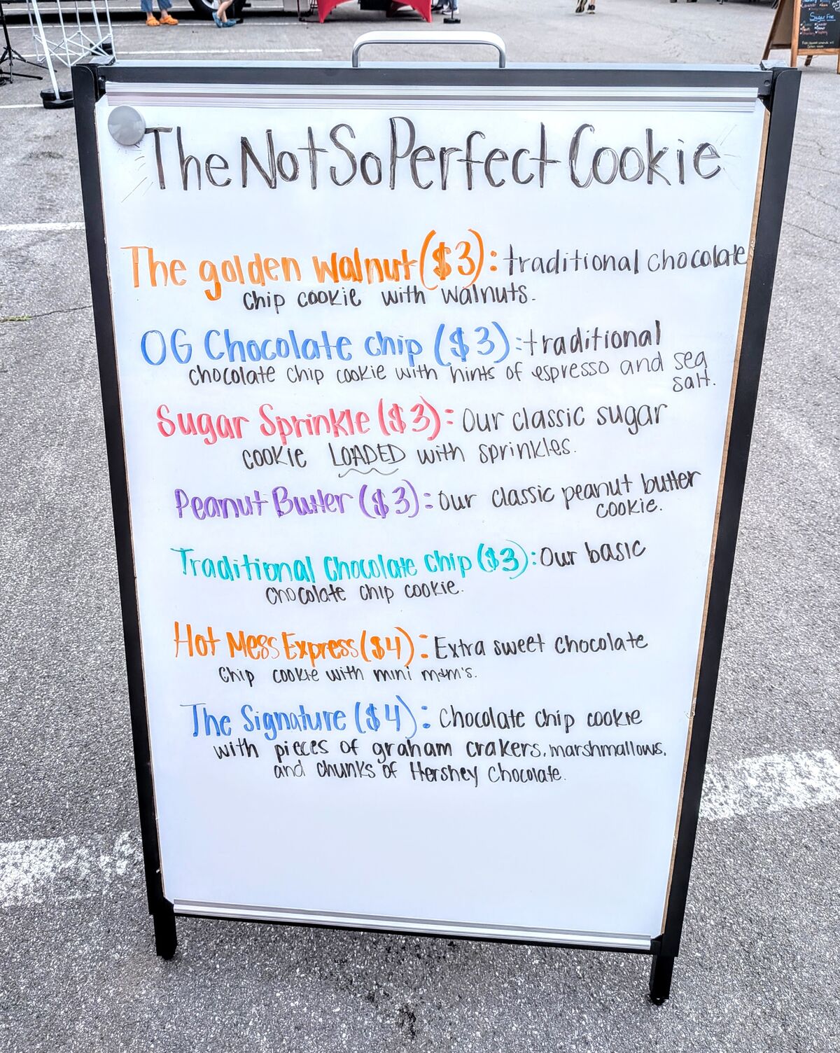 Handwritten cookie menu placard at the Victor Farmers' Market.